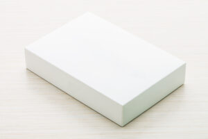 White box mock up on wooden background